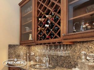 Elegant kitchen by Premier Kitchen, featuring a stylish Wine Rack and glass storage