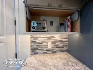 Appliance Garage with a lift-up cabinet door, showcasing a toaster and other kitchen items